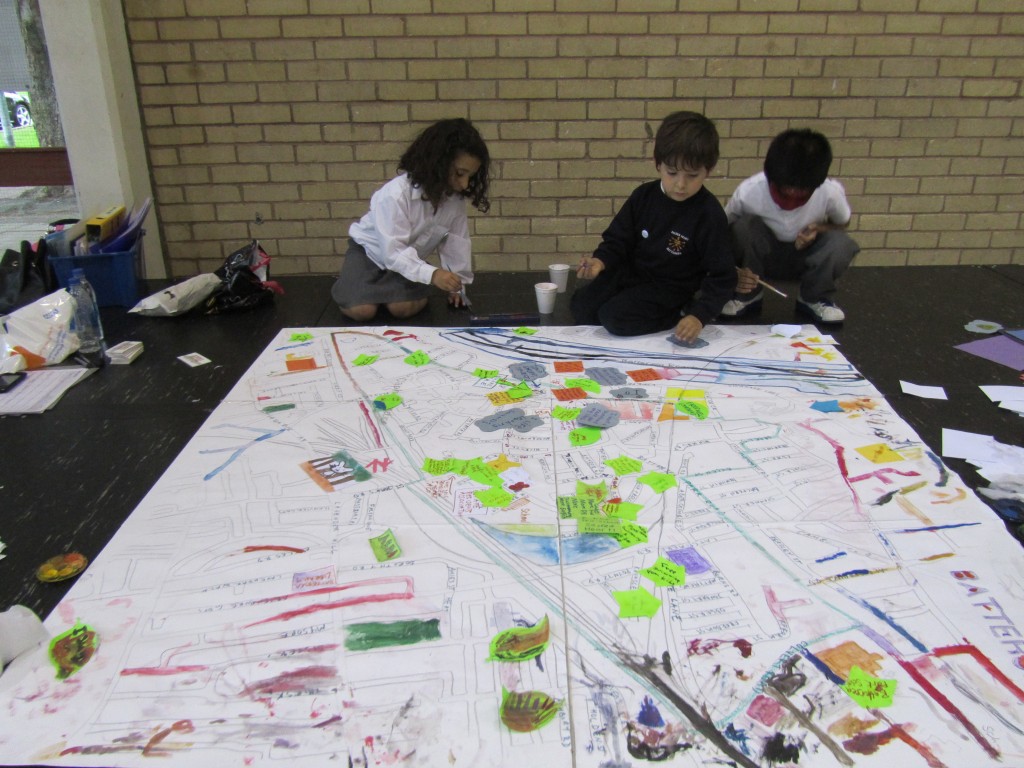The children drawing their ideas on the map of Big Local SW11